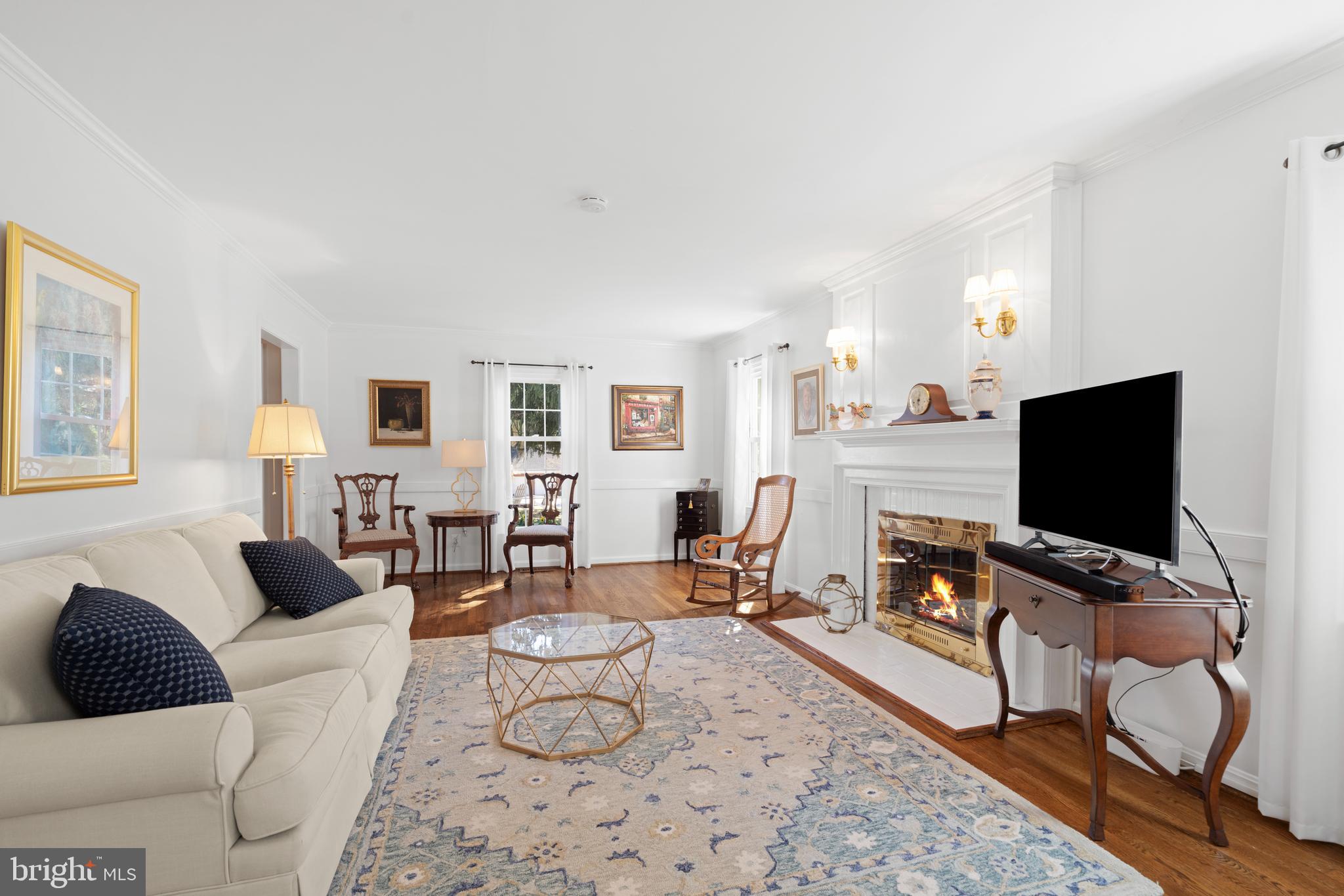 13714 Harcum Road Phoenix, MD 21131 - Photo 11 of 61 a living room with furniture and a flat screen tv