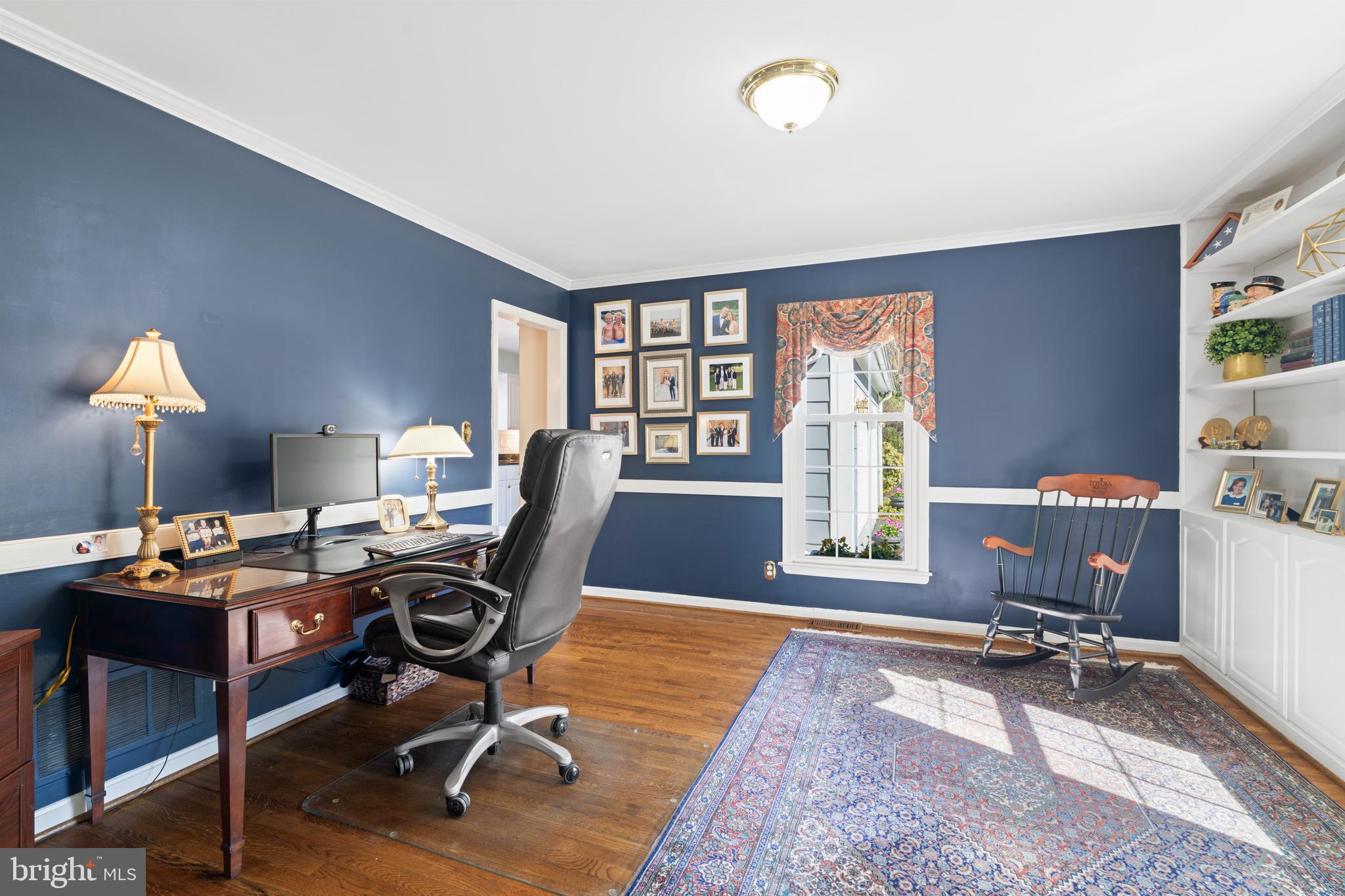13714 Harcum Road Phoenix, MD 21131 - Photo 13 of 61 a view of a workspace with furniture and a window
