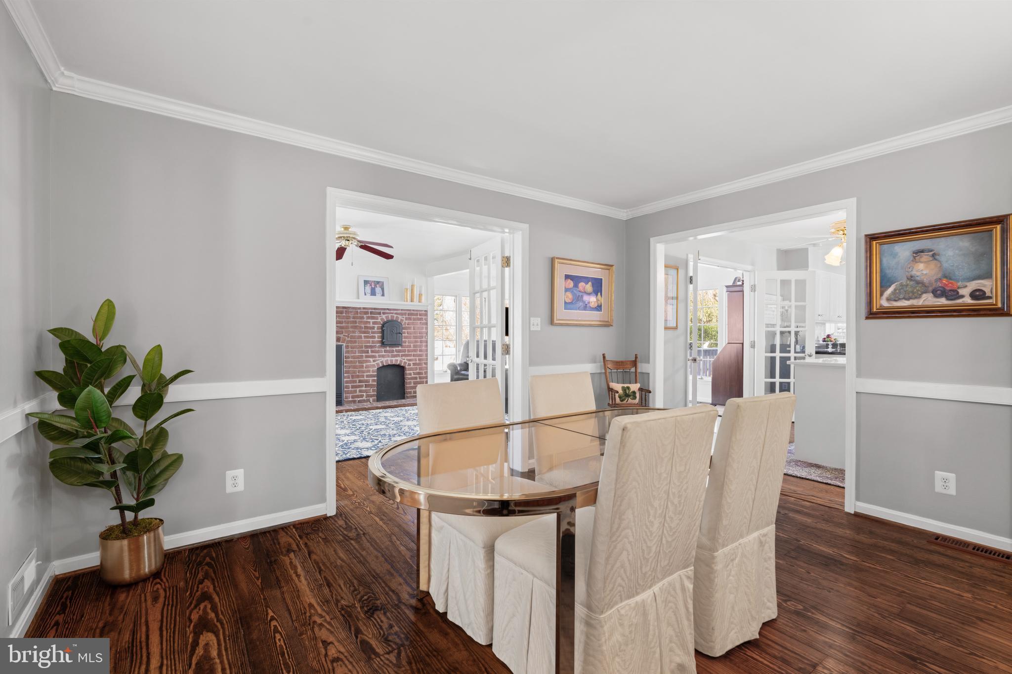 13714 Harcum Road Phoenix, MD 21131 - Photo 15 of 61 a view of a dining room with furniture window and wooden floor