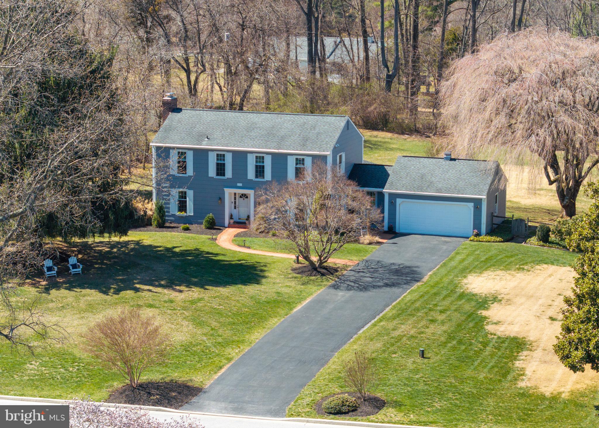 13714 Harcum Road Phoenix, MD 21131 - Photo 2 of 61 a front view of a house with a yard