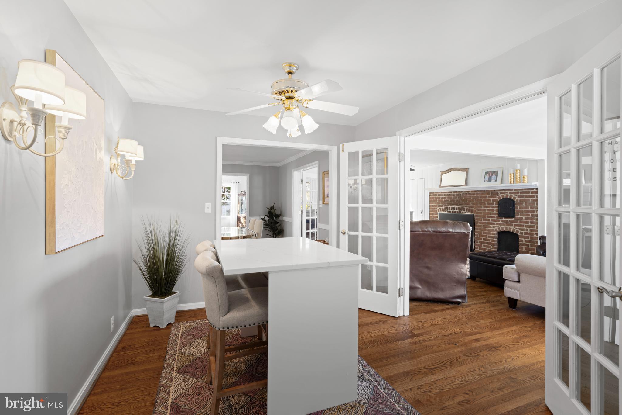 13714 Harcum Road Phoenix, MD 21131 - Photo 22 of 61 a view of kitchen living room with furniture and a fireplace