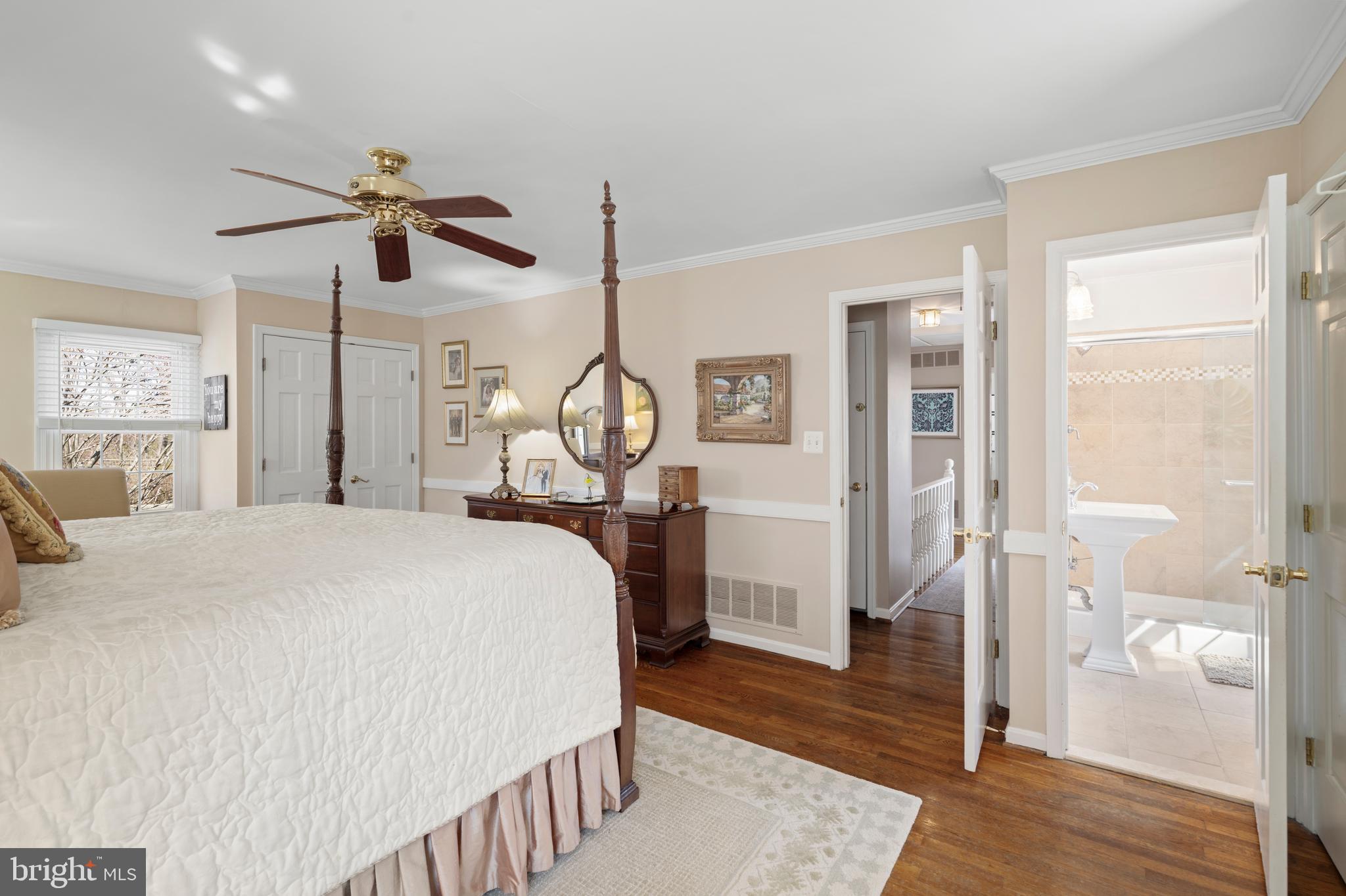 13714 Harcum Road Phoenix, MD 21131 - Photo 28 of 61 a bedroom with a bed a window and closet