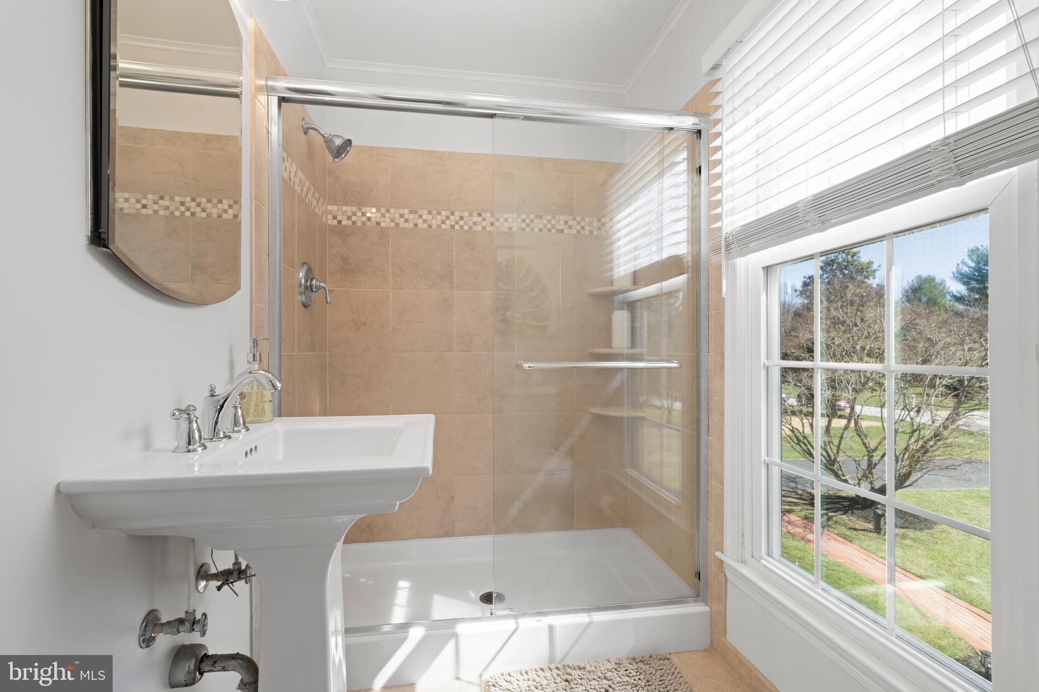 13714 Harcum Road Phoenix, MD 21131 - Photo 29 of 61 a bathroom with a sink and a mirror