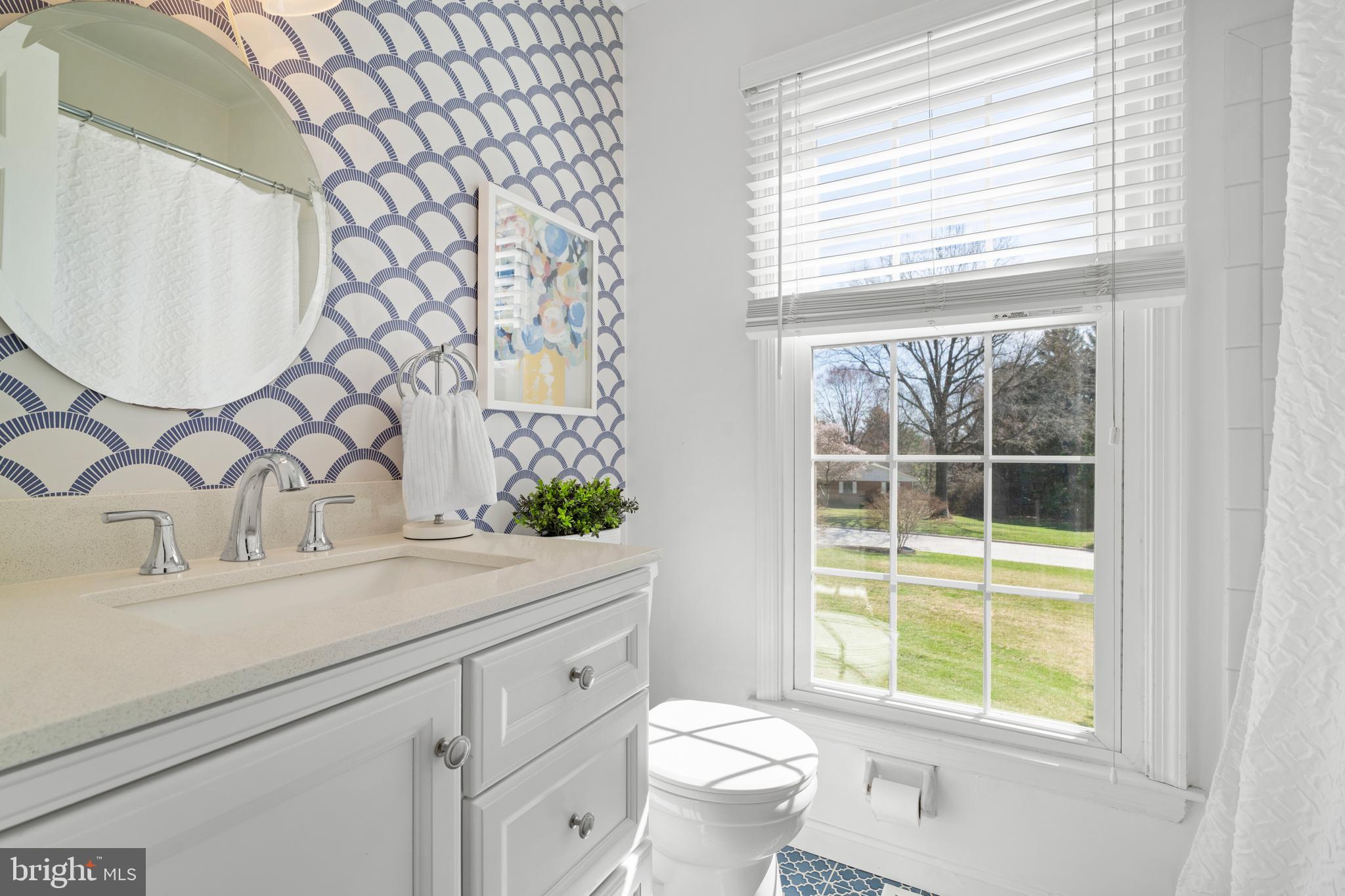 13714 Harcum Road Phoenix, MD 21131 - Photo 32 of 61 a bathroom with a sink a toilet and a window