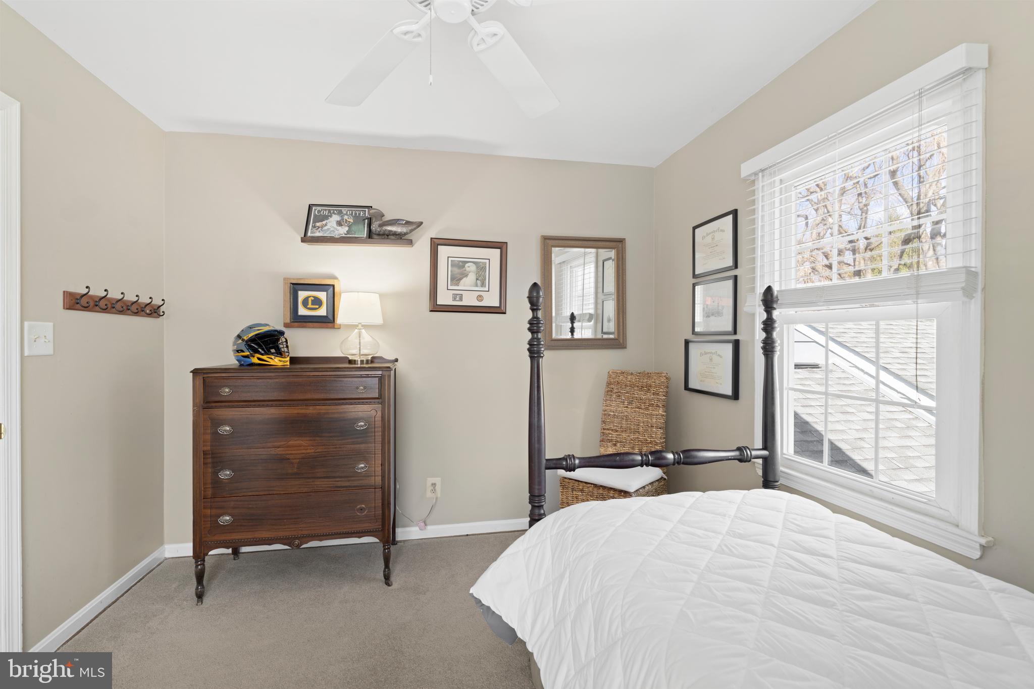 13714 Harcum Road Phoenix, MD 21131 - Photo 34 of 61 a bedroom with a bed and a dresser