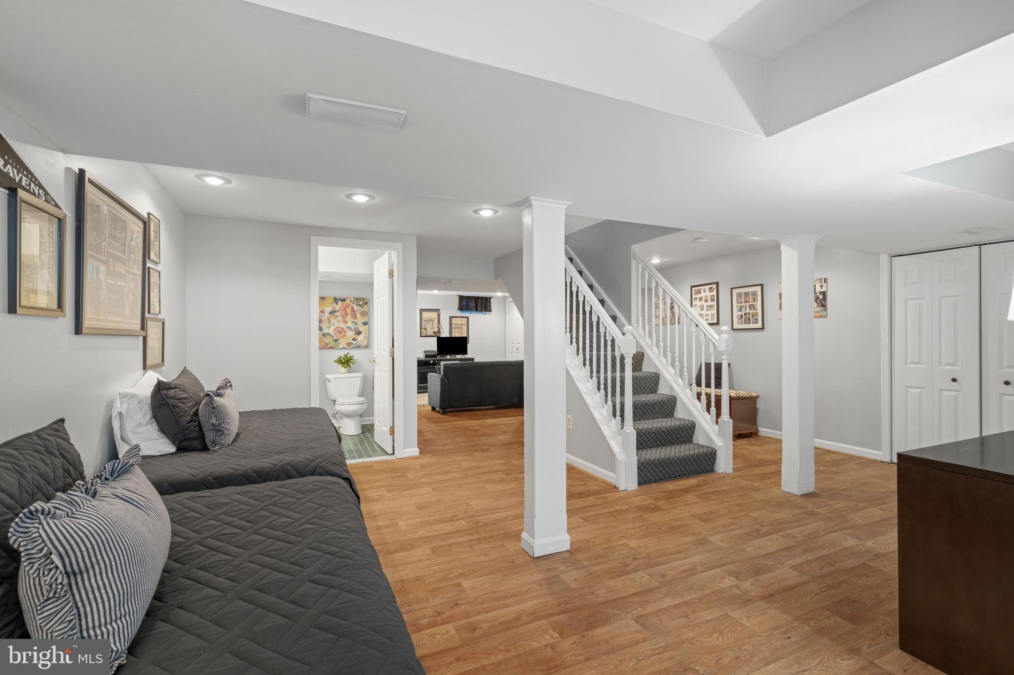 13714 Harcum Road Phoenix, MD 21131 - Photo 37 of 61 a living room with furniture and a wooden floor