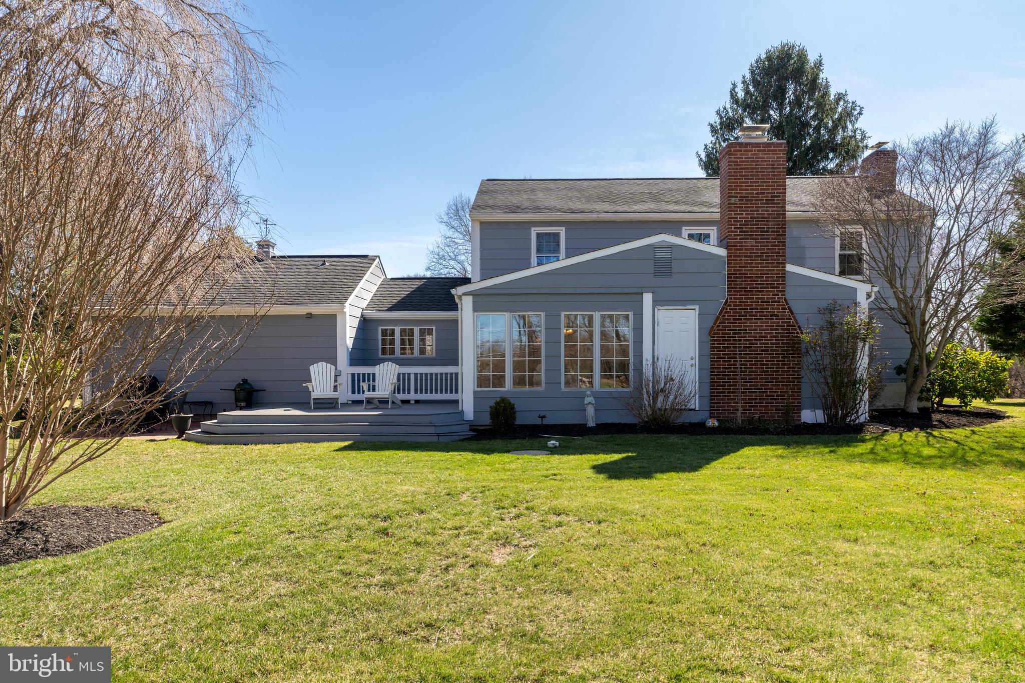 13714 Harcum Road Phoenix, MD 21131 - Photo 48 of 61 a view of a house with a big yard and a large tree