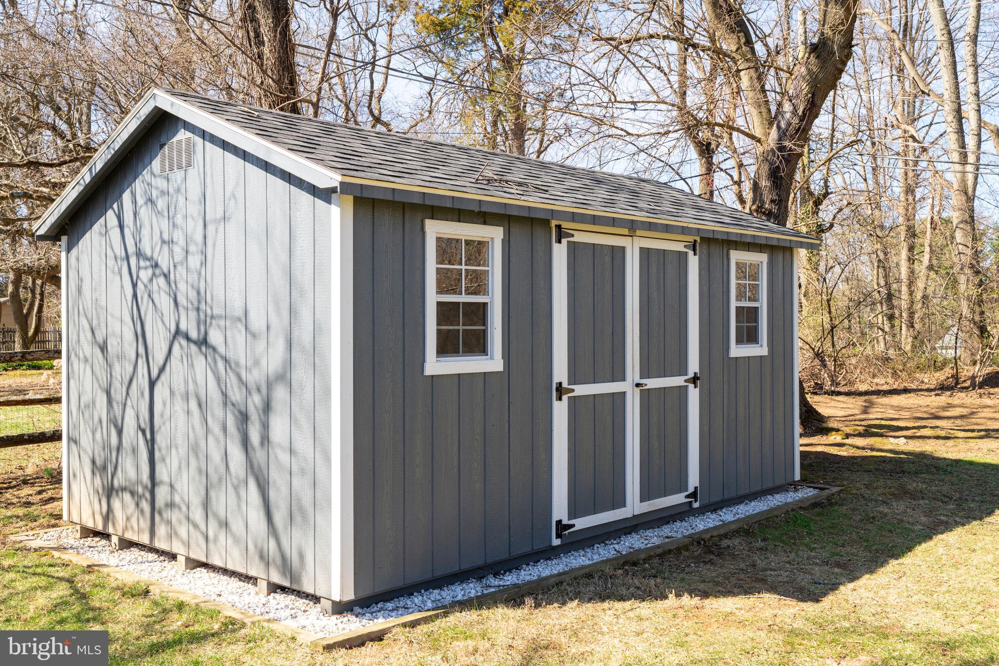 13714 Harcum Road Phoenix, MD 21131 - Photo 50 of 61 a view of a house with backyard and wooden fence