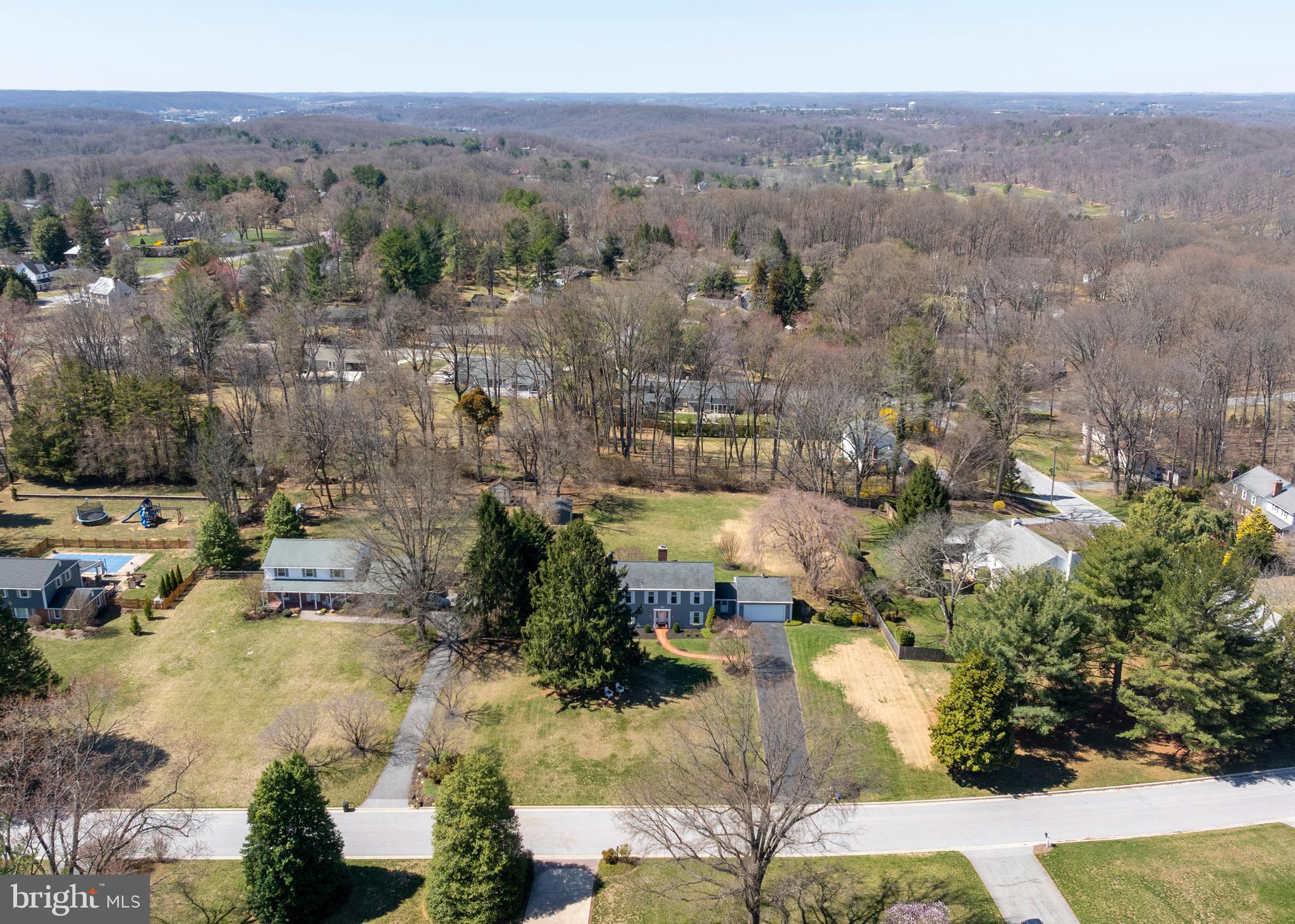 13714 Harcum Road Phoenix, MD 21131 - Photo 52 of 61 an aerial view of residential house and lake view