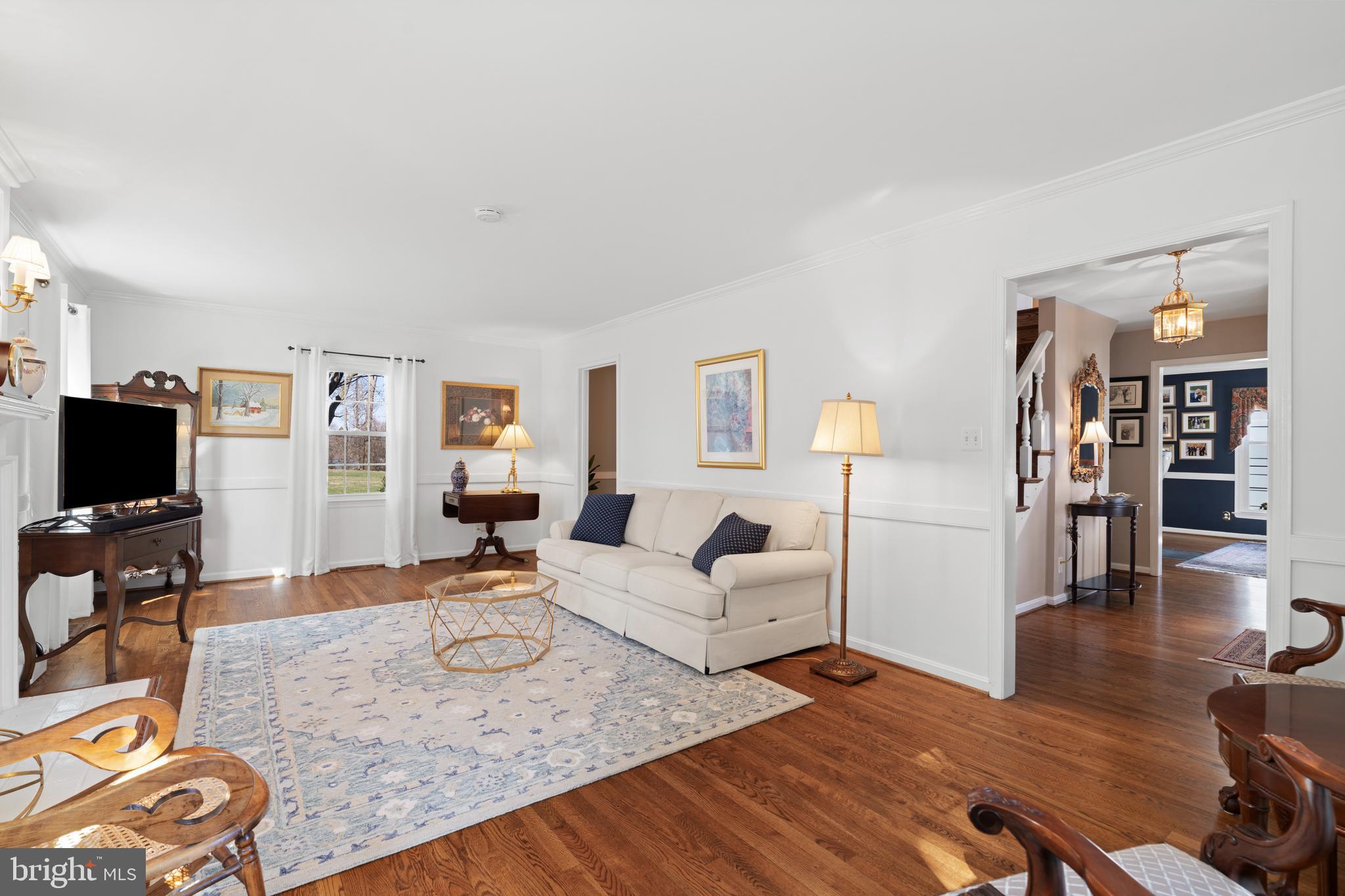 13714 Harcum Road Phoenix, MD 21131 - Photo 9 of 61 a living room with furniture and wooden floor