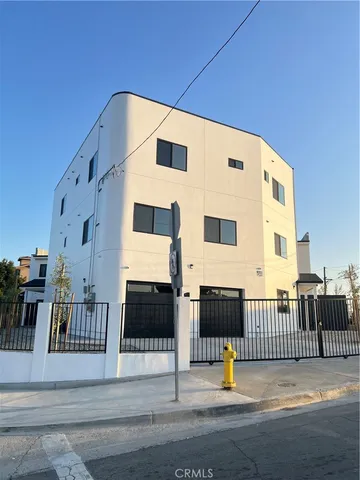 a view of a big room with staircase