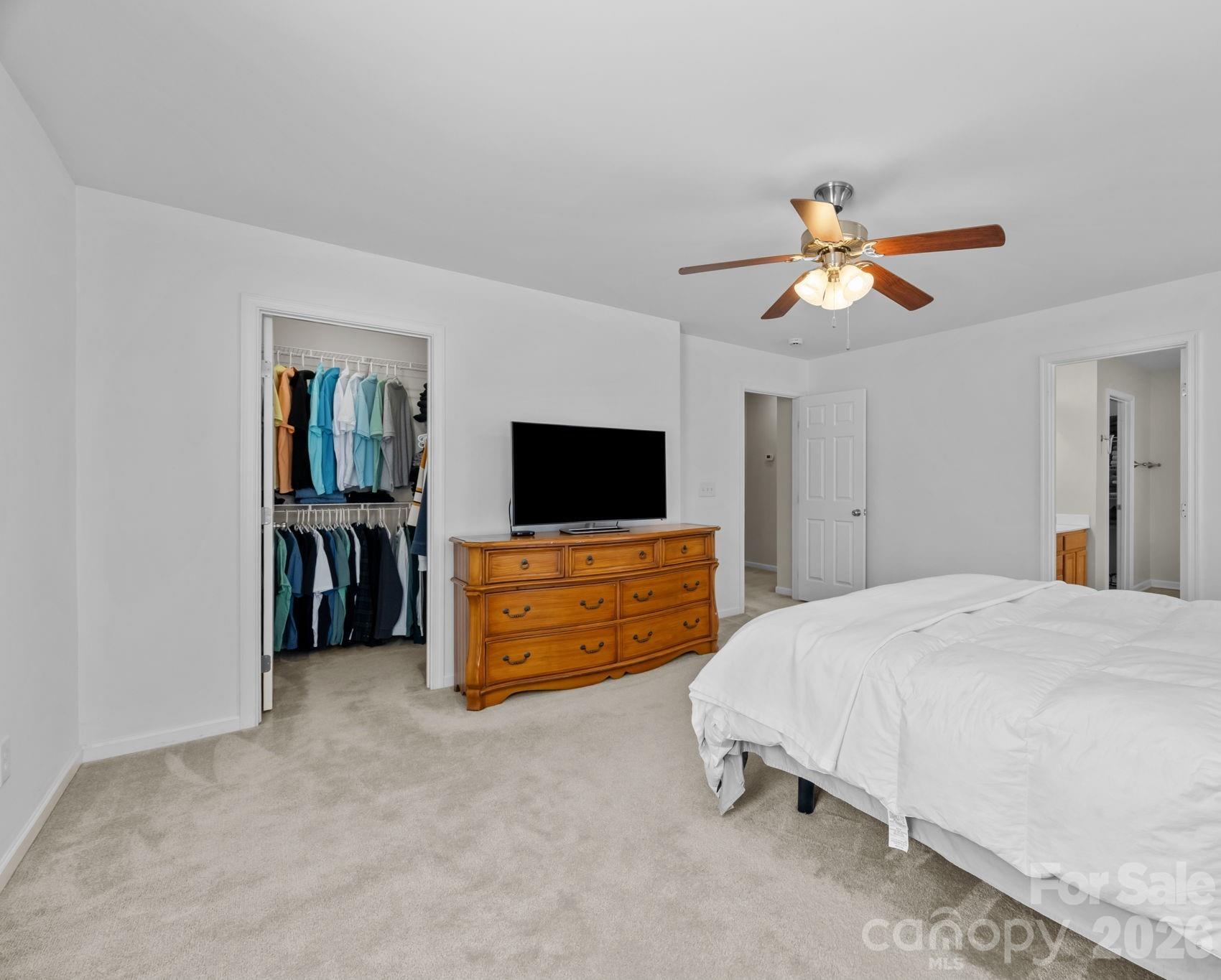 444 Battery Circle Clover, SC 29710 - Photo 9 of 22 a bedroom with a bed and a flat screen tv