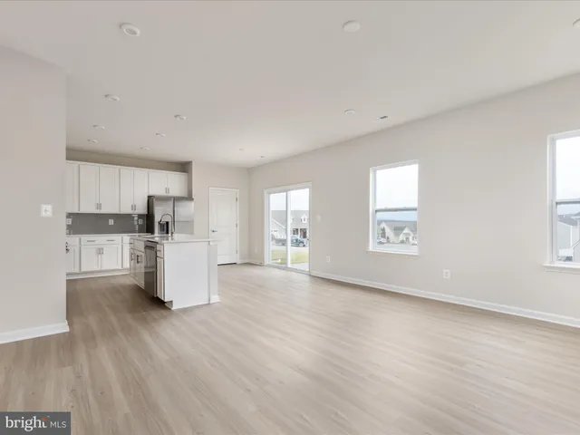 a view of swimming pool with outdoor seating