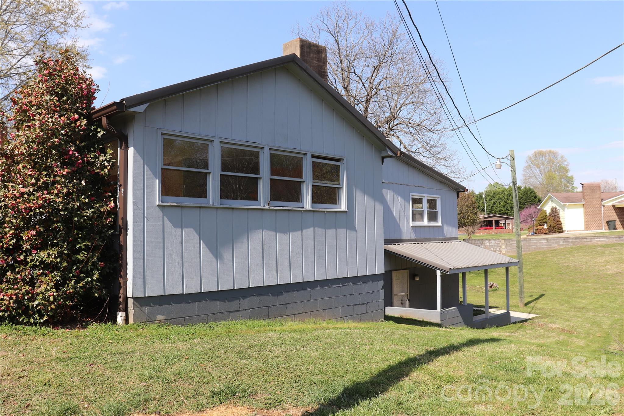 4543 Horseshoe Bend Road Hudson, NC 28638 - Photo 24 of 38 a front view of a house with garden