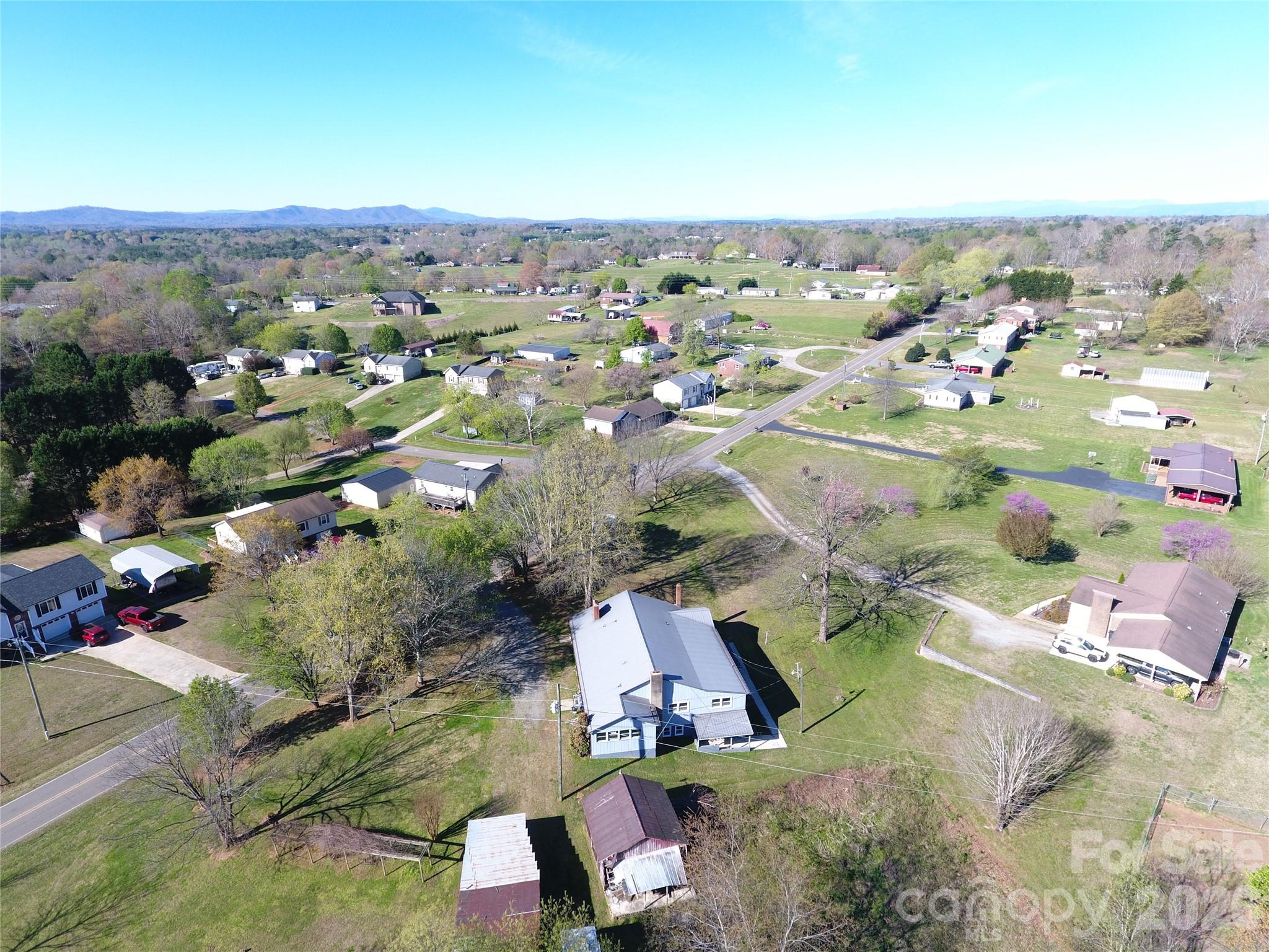 4543 Horseshoe Bend Road Hudson, NC 28638 - Photo 3 of 38 an aerial view of residential houses with outdoor space