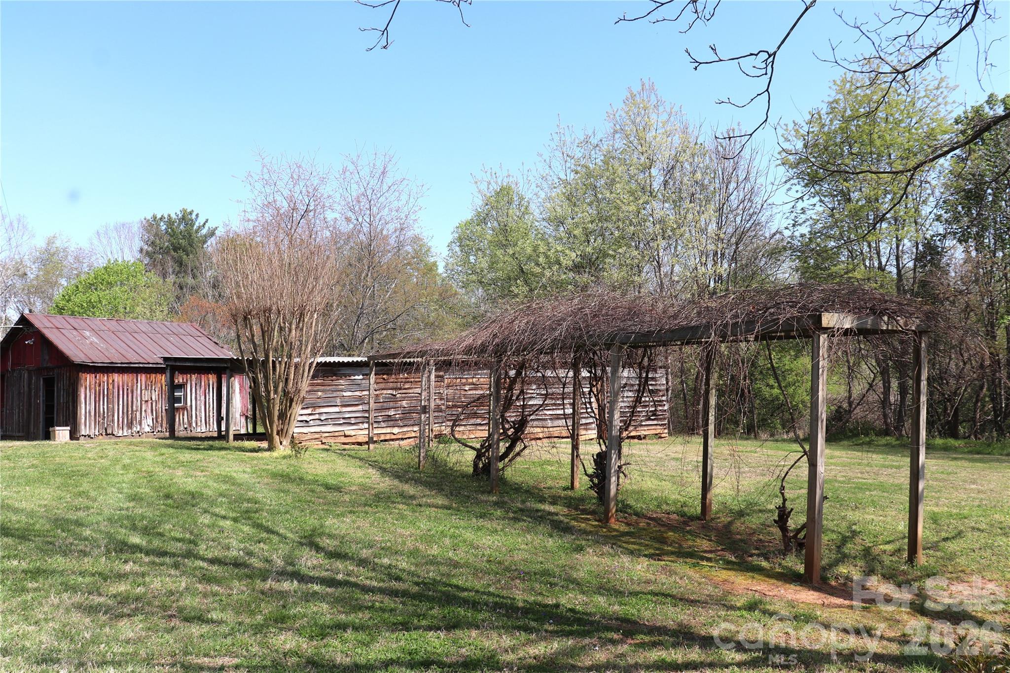 4543 Horseshoe Bend Road Hudson, NC 28638 - Photo 38 of 38 a house view with a backyard space
