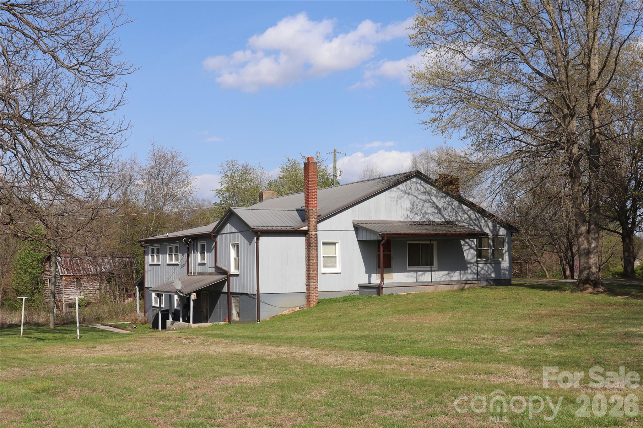 4543 Horseshoe Bend Road Hudson, NC 28638 - Photo 7 of 38 a front view of a house with garden