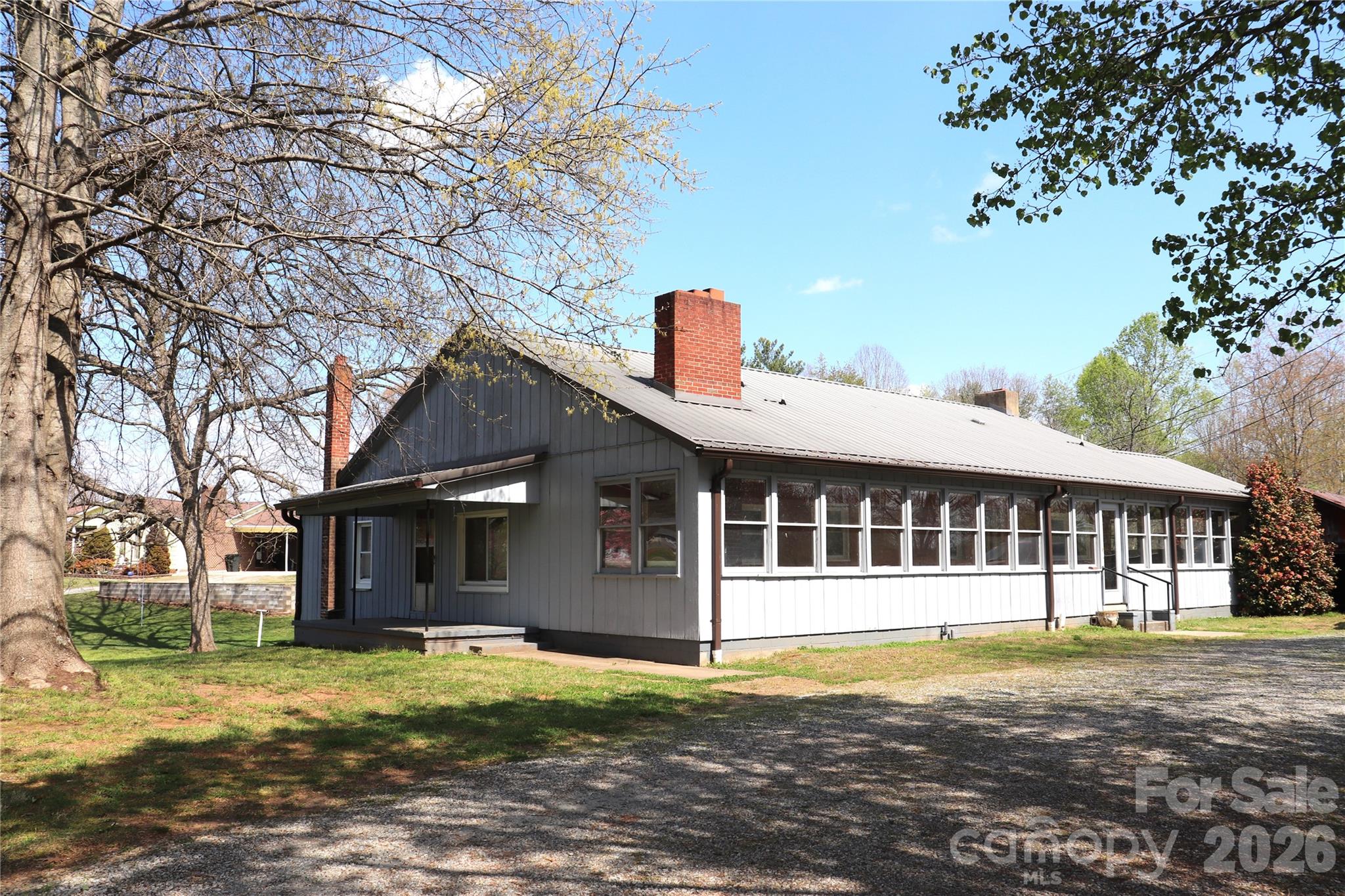 4543 Horseshoe Bend Road Hudson, NC 28638 - Photo 8 of 38 a view of a house with a yard