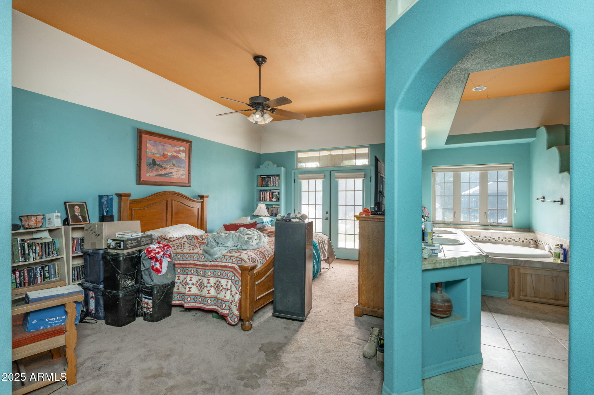 35575 West Pale Moon Road Seligman, AZ 86337 - Photo 12 of 45 a bedroom with bed and window