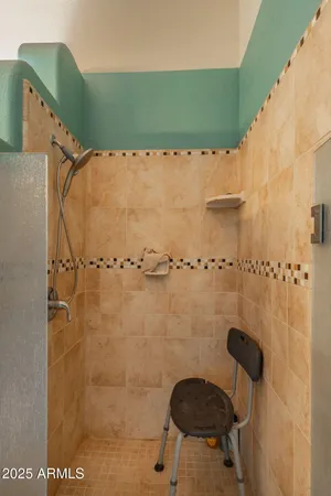 a bathroom with a sink double vanity and a mirror