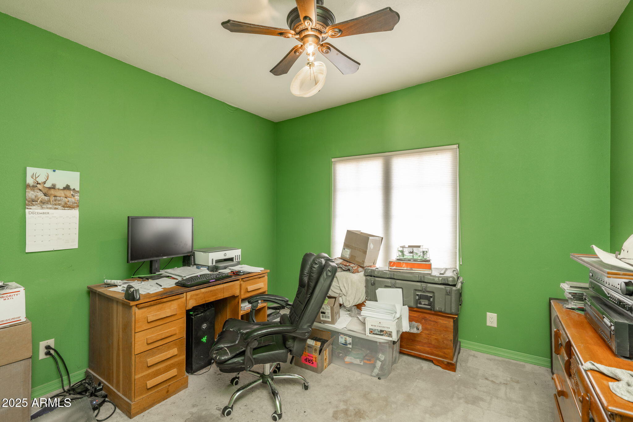 35575 West Pale Moon Road Seligman, AZ 86337 - Photo 17 of 45 a view of a workspace with furniture and a window