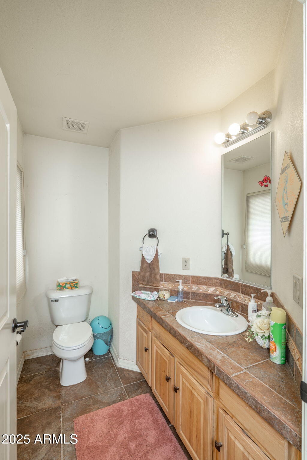 35575 West Pale Moon Road Seligman, AZ 86337 - Photo 21 of 45 a bathroom with a sink and a toilet