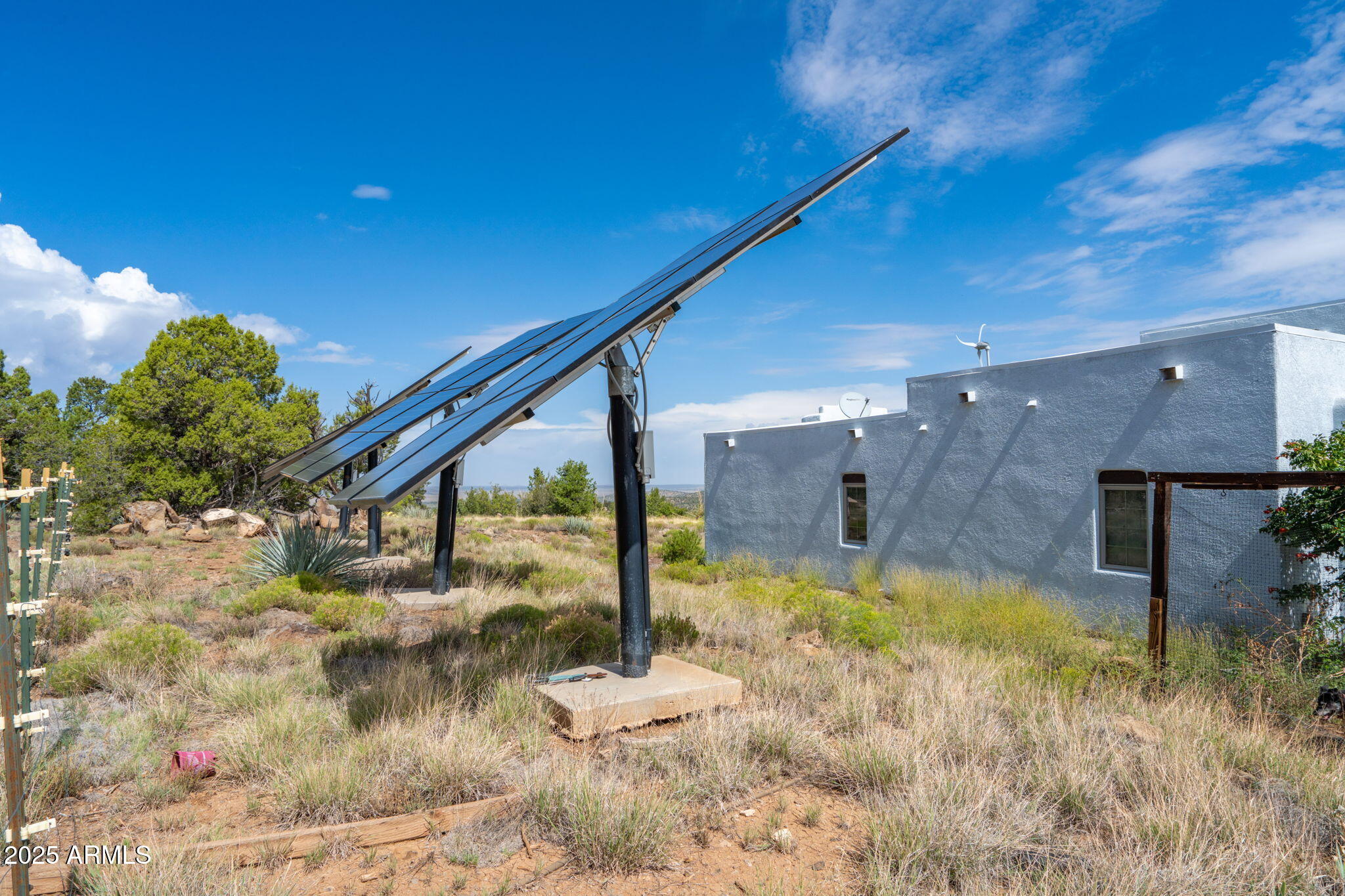 35575 West Pale Moon Road Seligman, AZ 86337 - Photo 24 of 45 a view of a house with a yard