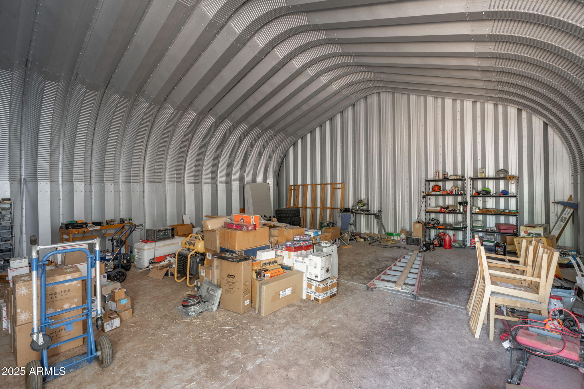 35575 West Pale Moon Road Seligman, AZ 86337 - Photo 30 of 45 an outdoor sitting area with couch and chairs
