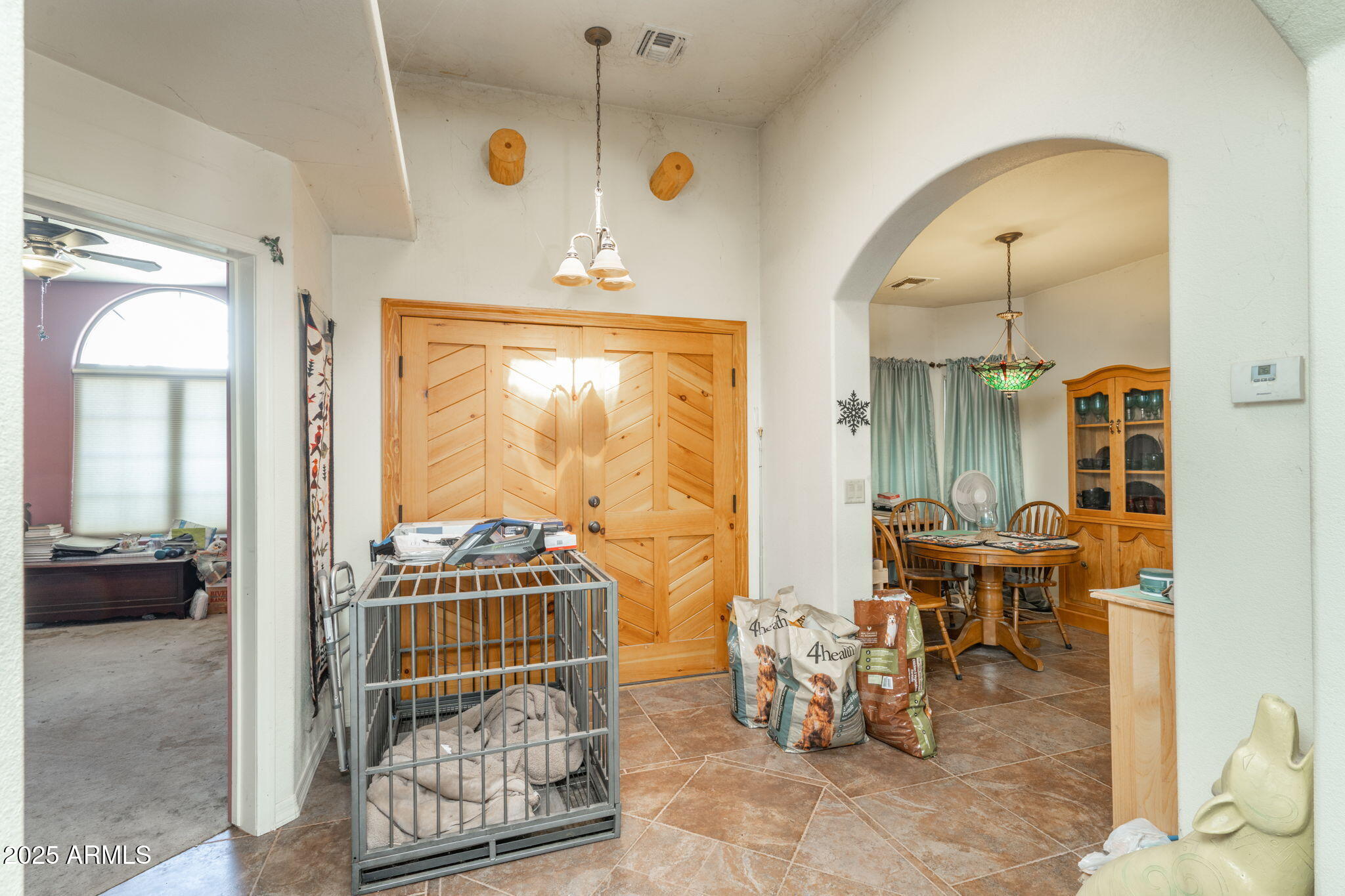35575 West Pale Moon Road Seligman, AZ 86337 - Photo 3 of 45 a view of a dining room with furniture window and outside view
