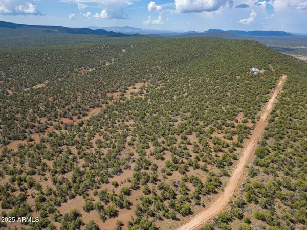 a view of a small space near a lake