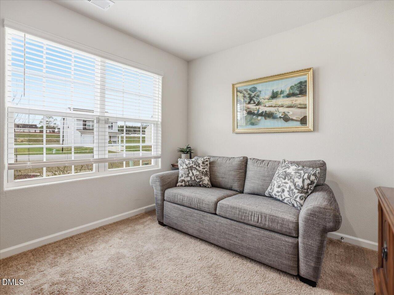 90 Barnsley Road Angier, NC 27501 - Photo 26 of 40 a living room with furniture and a window