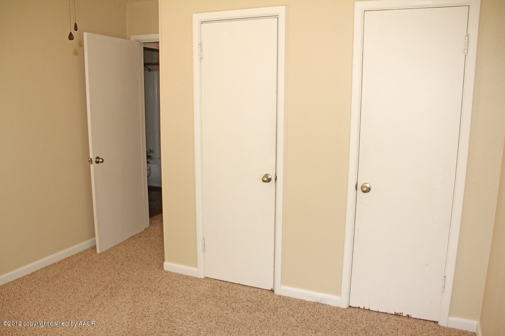 4306 South Hayden Street Amarillo, TX 79110 - Photo 12 of 23 a view of a bathroom with a shower