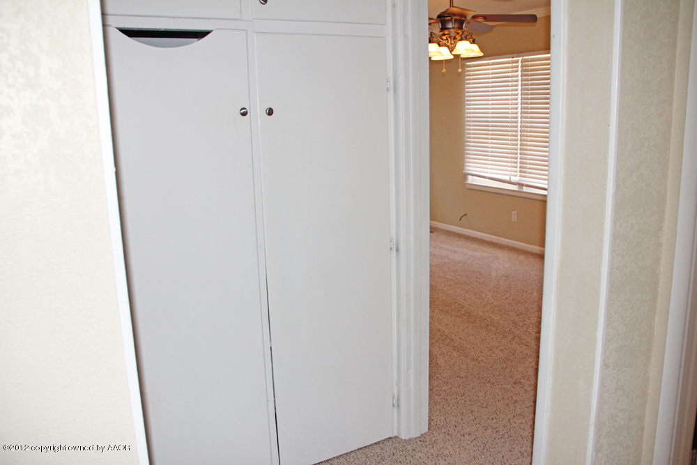 4306 South Hayden Street Amarillo, TX 79110 - Photo 13 of 23 a view of an empty room with a window