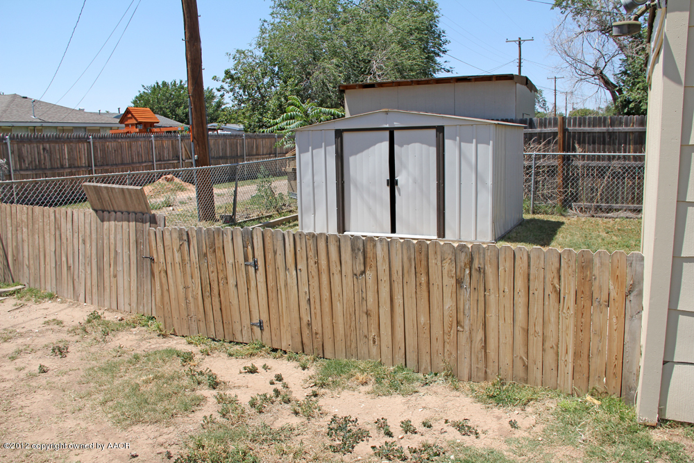 4306 South Hayden Street Amarillo, TX 79110 - Photo 23 of 23 a view of a wooden fence