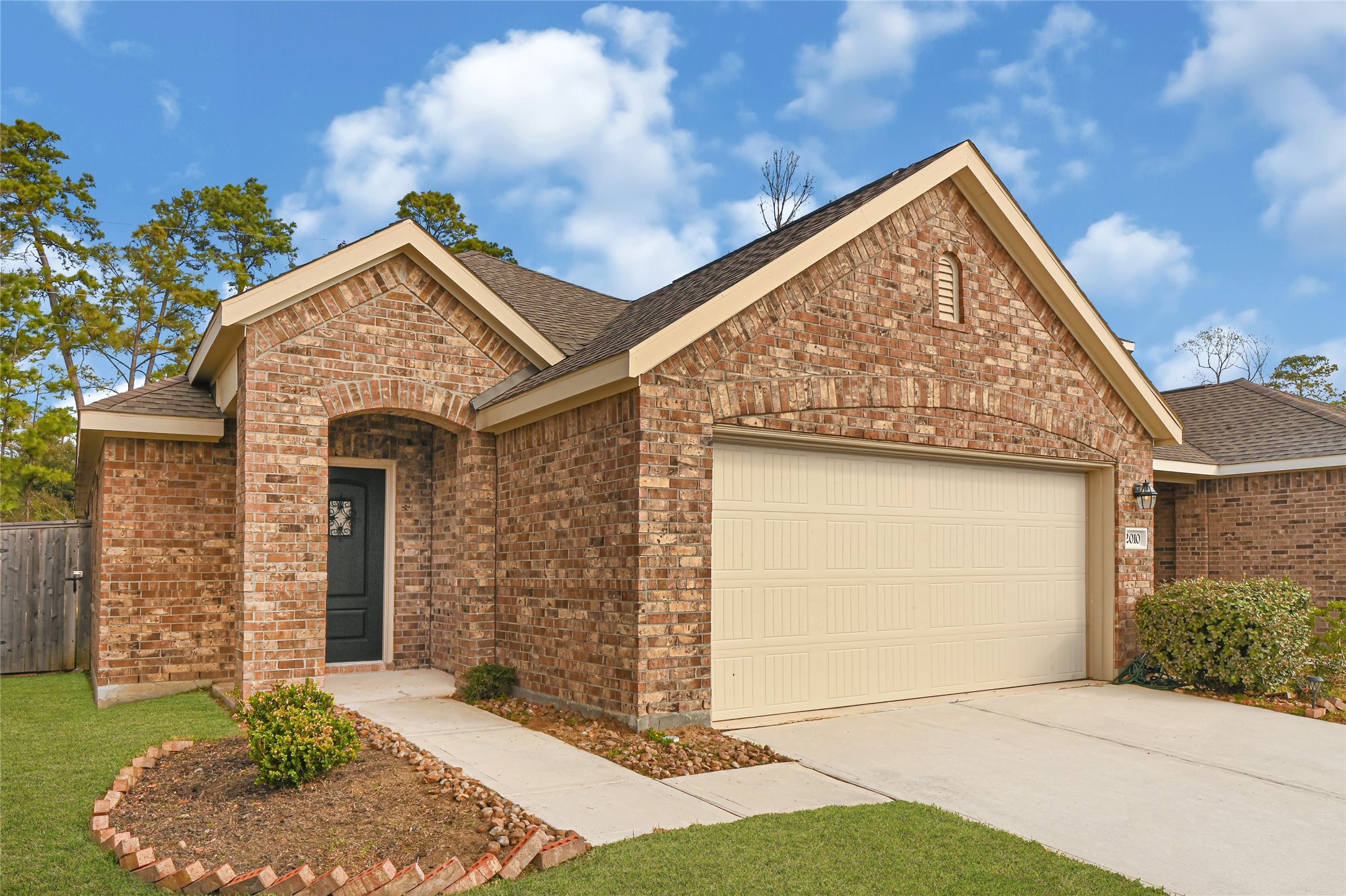 2010 Ballesteros Street Crosby, TX 77532 - Photo 2 of 24 front view of a house with a yard