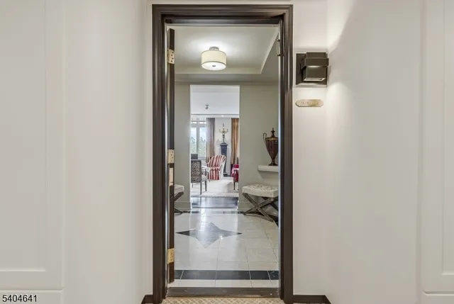 a view of a livingroom from a hallway