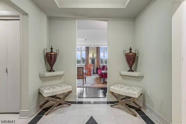 a room that has a bed and a table in it