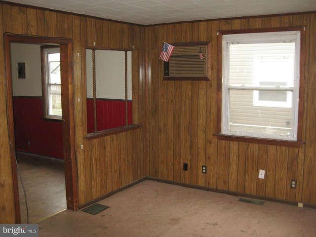 8232 Cornwall Road Baltimore, MD 21222 - Photo 9 of 14 an empty room with windows and closet