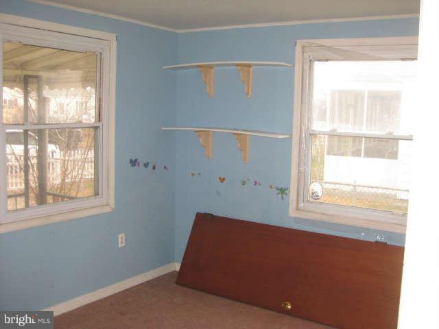 8232 Cornwall Road Baltimore, MD 21222 - Photo 10 of 14 a view of room with window