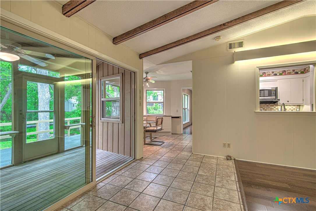 2701 Wren Circle Temple, TX 76502 - Photo 16 of 48 a view of a hallway with wooden floor and windows