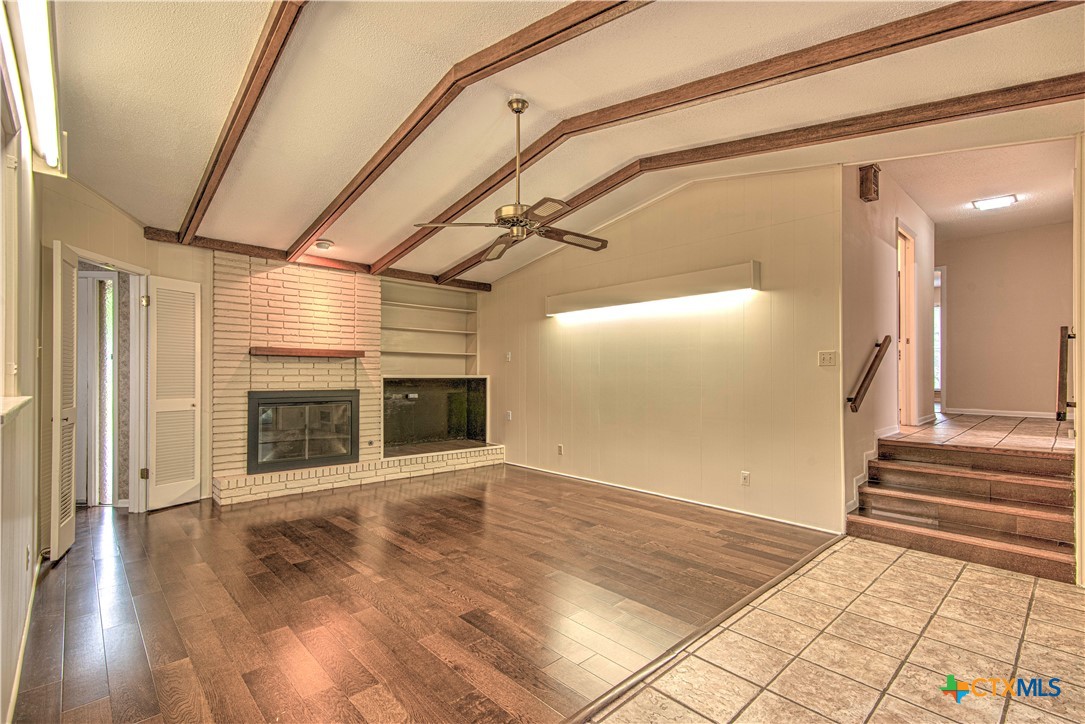 2701 Wren Circle Temple, TX 76502 - Photo 17 of 48 a view of a livingroom with wooden floor and a fireplace