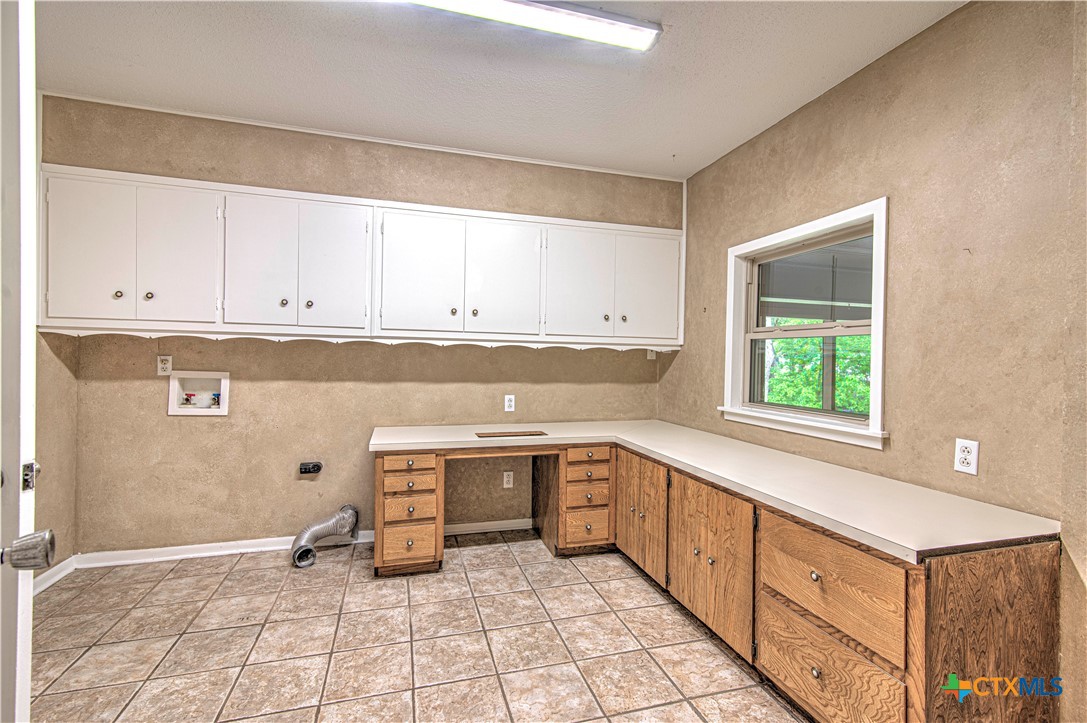 2701 Wren Circle Temple, TX 76502 - Photo 22 of 48 a kitchen with stainless steel appliances granite countertop a sink and cabinets