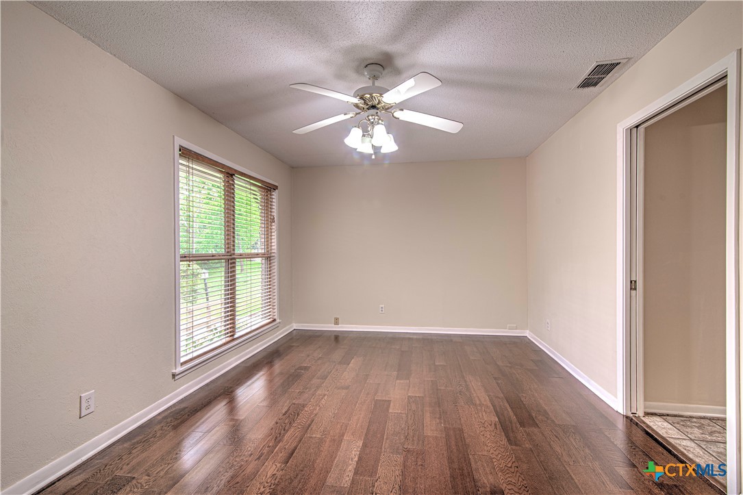2701 Wren Circle Temple, TX 76502 - Photo 29 of 48 wooden floor in an empty room with a window