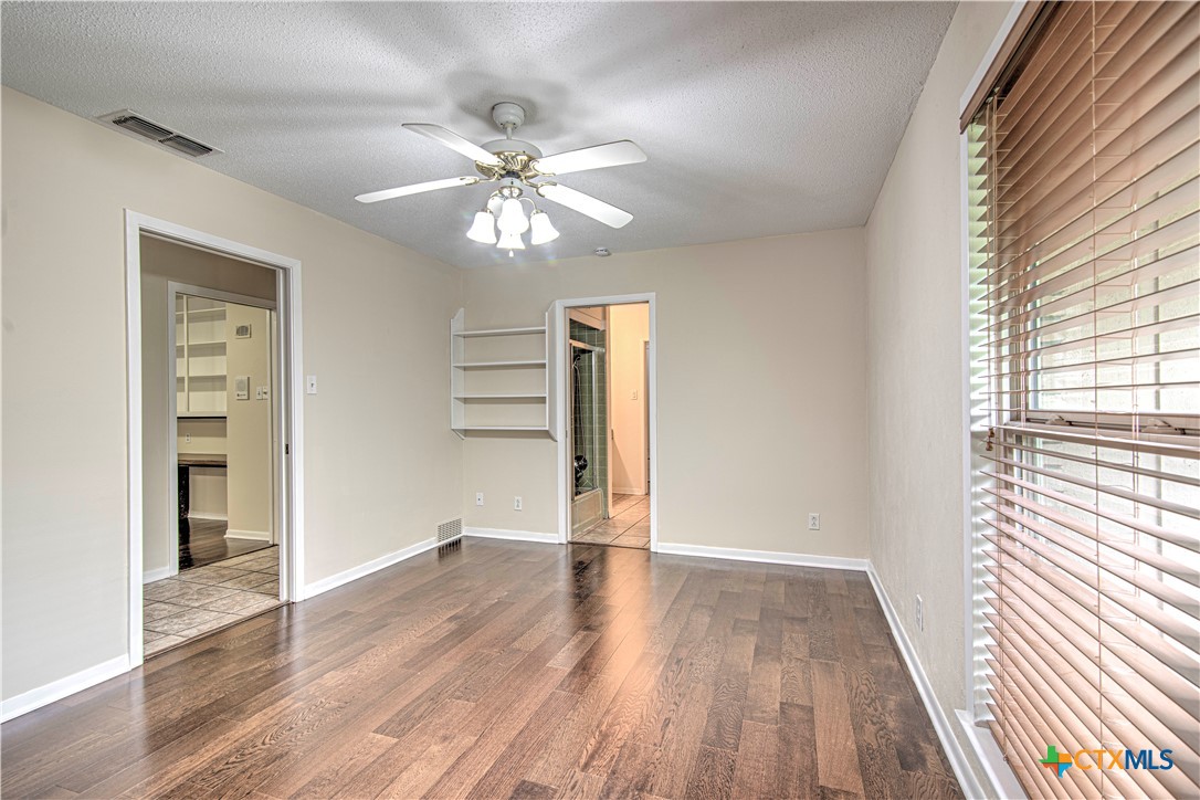 2701 Wren Circle Temple, TX 76502 - Photo 30 of 48 wooden floor in an empty room with a window
