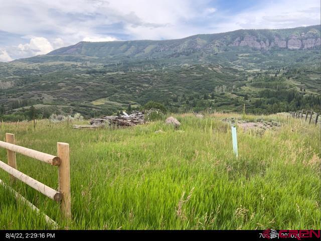289 Eagles Rest Drive Montrose, CO 81403 - Photo 4 of 10 a view of lake with mountain