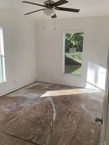 a view of a room that has a window in it