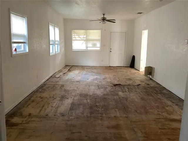 an empty room with windows