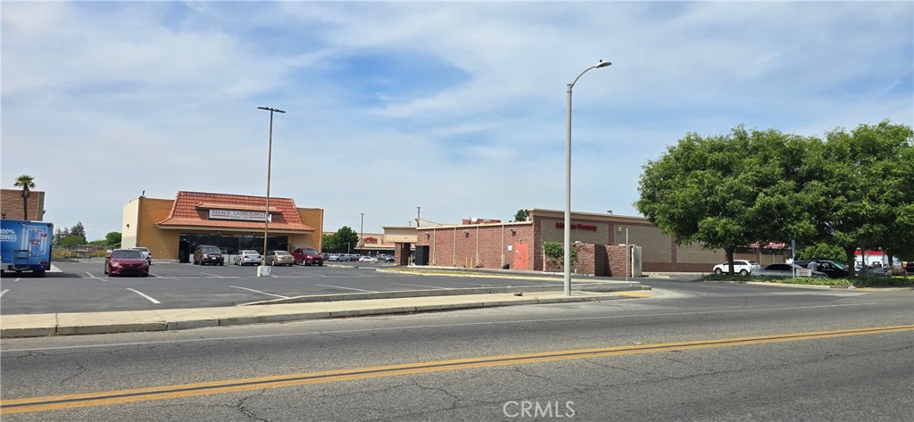 0 West Inyo Avenue Tulare, CA 93274 - Photo 13 of 24 a view of a building with cars parked
