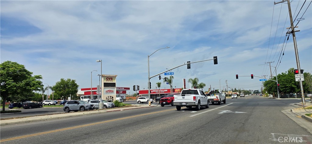 0 West Inyo Avenue Tulare, CA 93274 - Photo 16 of 24 a view of a cars parked in front of a building