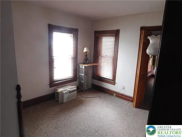 an empty room with window